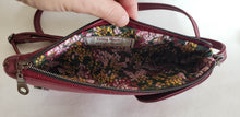 Load image into Gallery viewer, Side of bag open and showing pouch interior with Emmy Bauer label